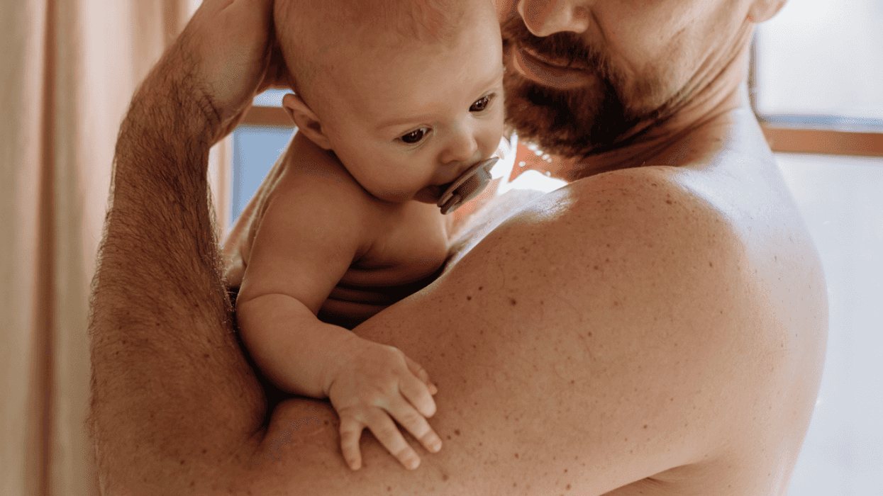 Dad with newborn baby