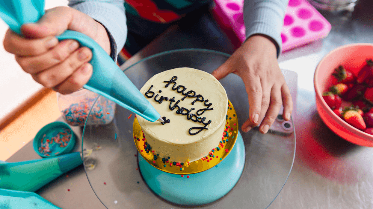 Decorating a birthday cake