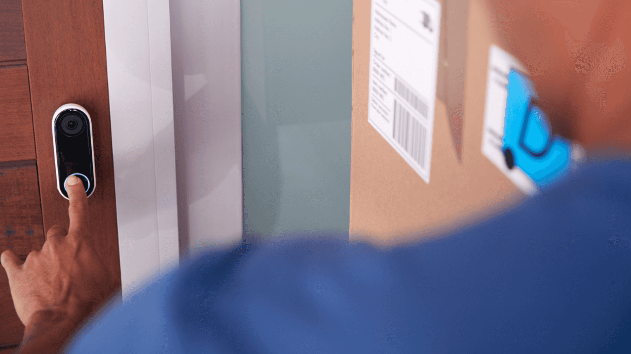 delivery driver ringing camera doorbell