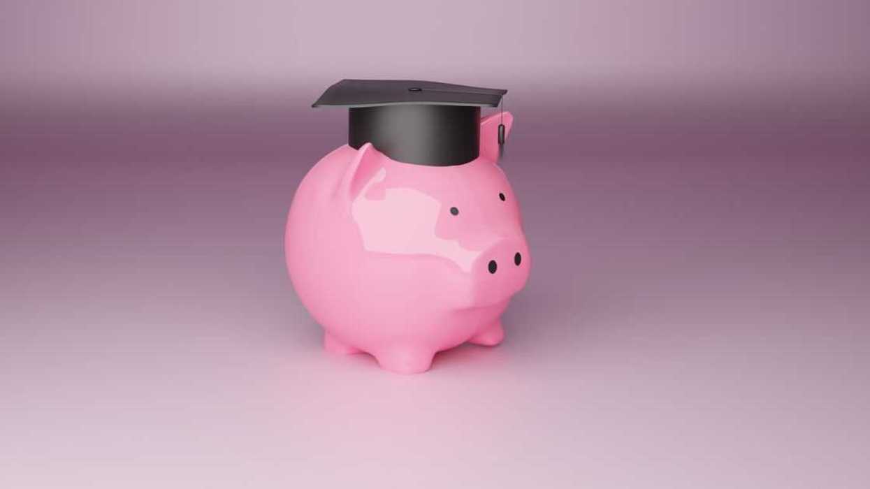 Digitally Generated Image of a piggy bank wearing a graduation cap.