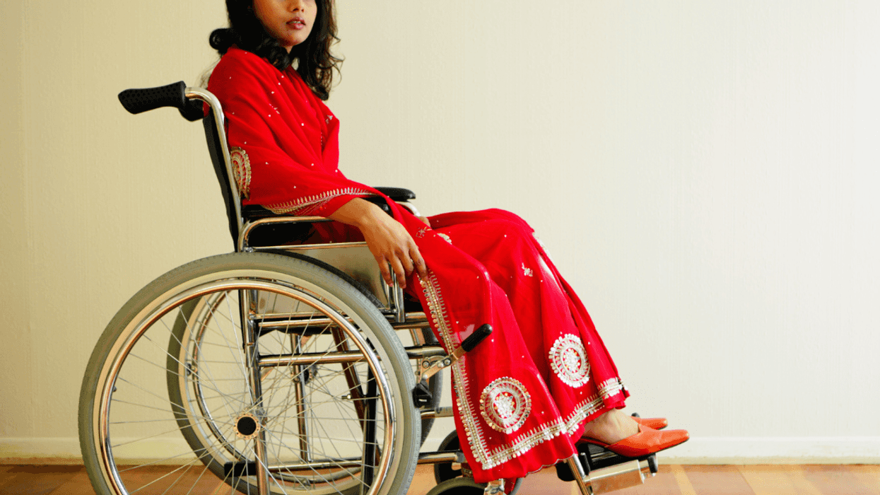 disablee woman in red sari