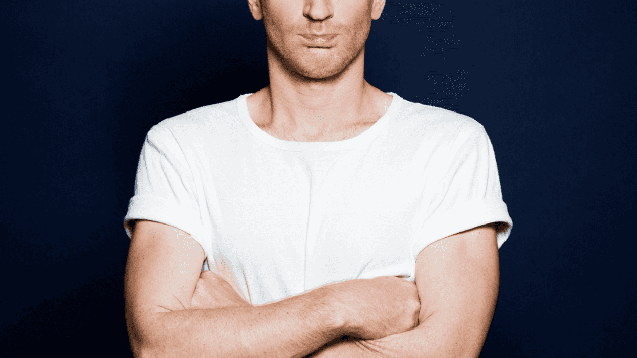 Disgruntled man with arms crossed