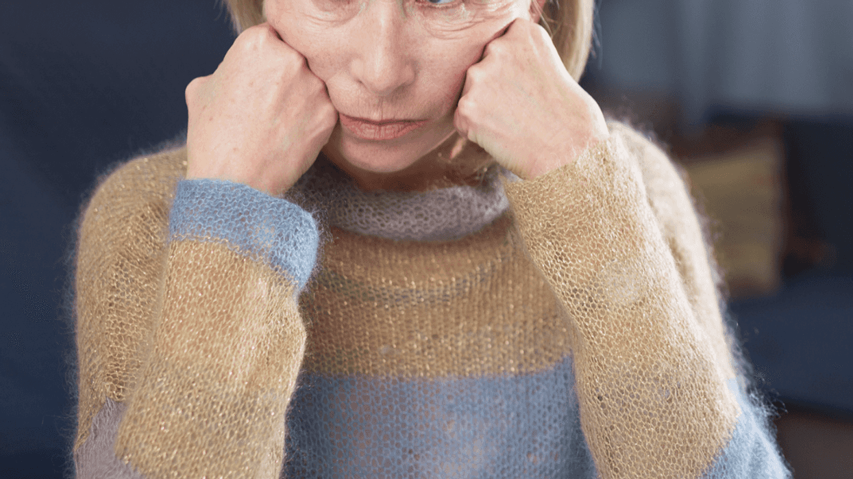 Dismayed older woman