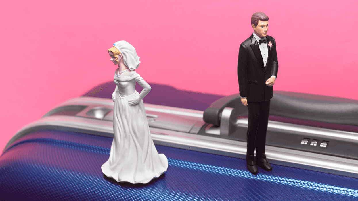 Divorce honeymoon couple on suitcase