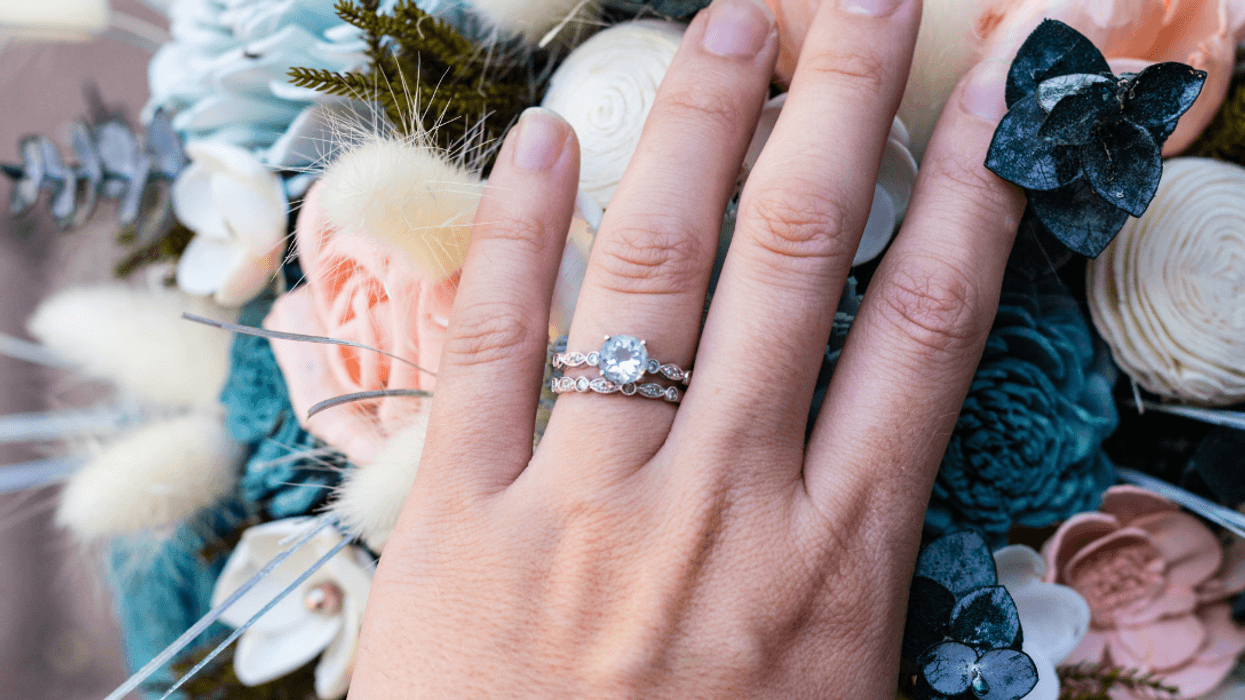 engagement ring with pale blue stone