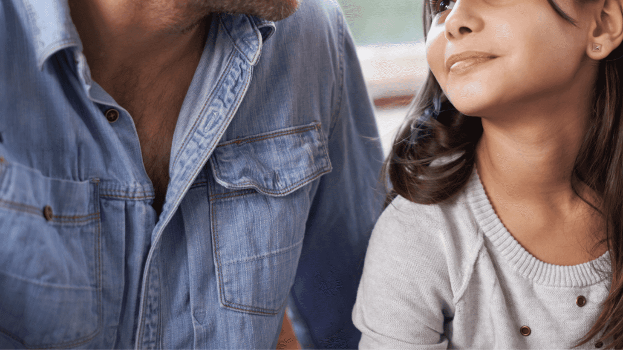 Father talking to his ten-year-old daughter