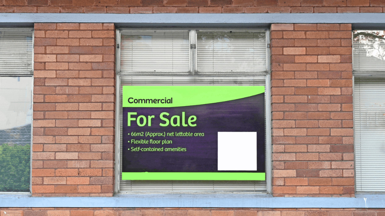 for sale sign on commercial property