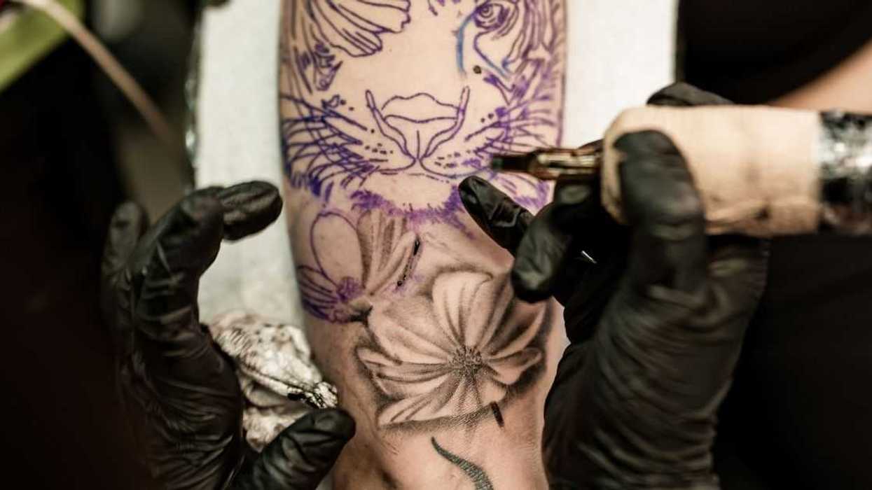 Tattoo Artist Called 'Anorexic Skinny Hoe' For Refusing To Tattoo Extremely Overweight Client