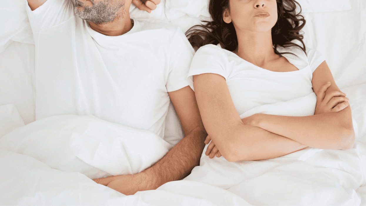 frustrated couple in bed
