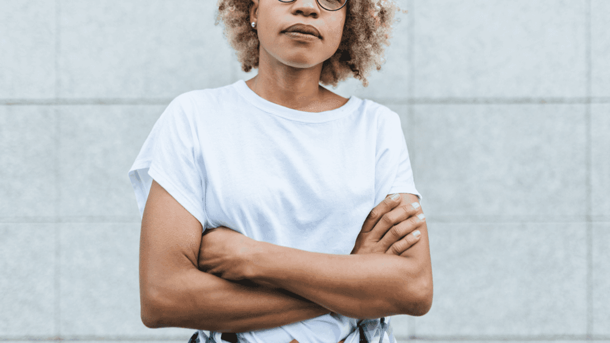 Frustrated young woman with arms crossed
