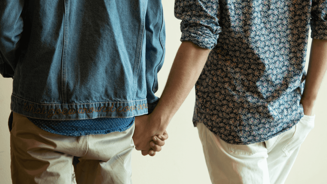 Gay couple holding hands