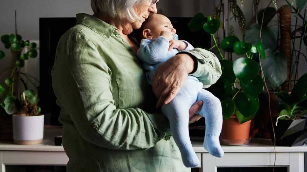 Grandmother holding a baby