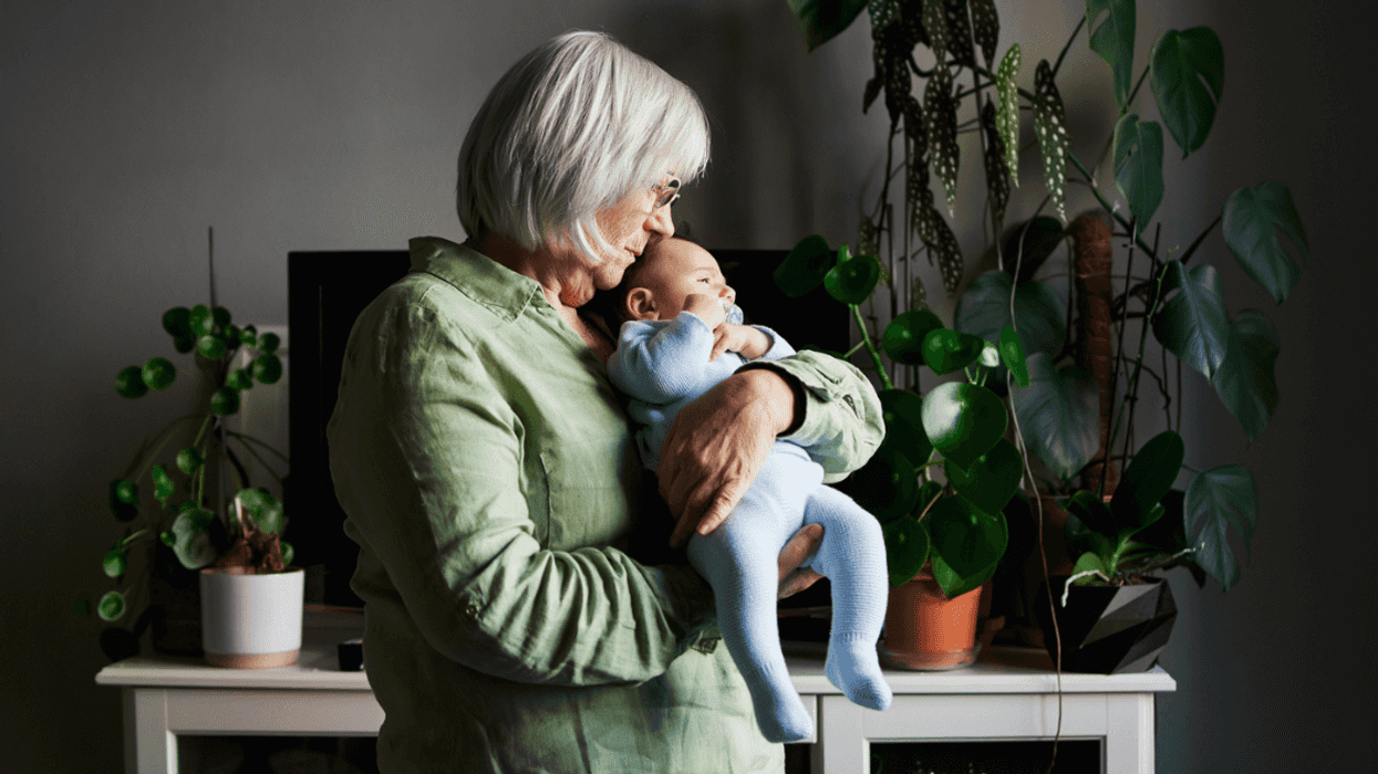 Grandmother holding her grandchild