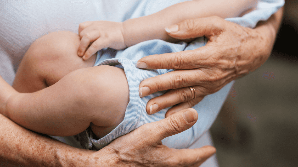 Grandparent holding baby