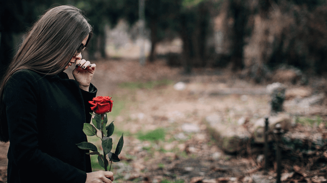 Grieving woman at funeral