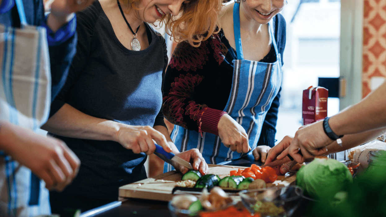 Group of women cooking in a kitchen