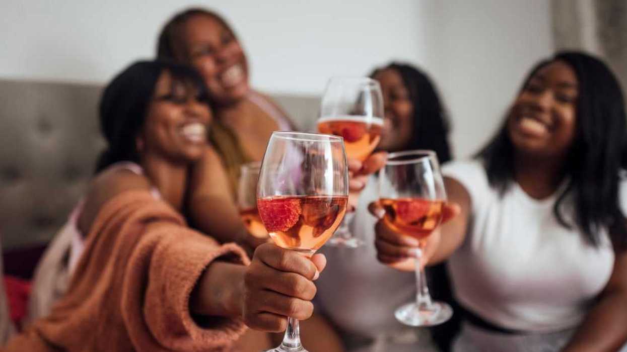 Group of women raising a toast