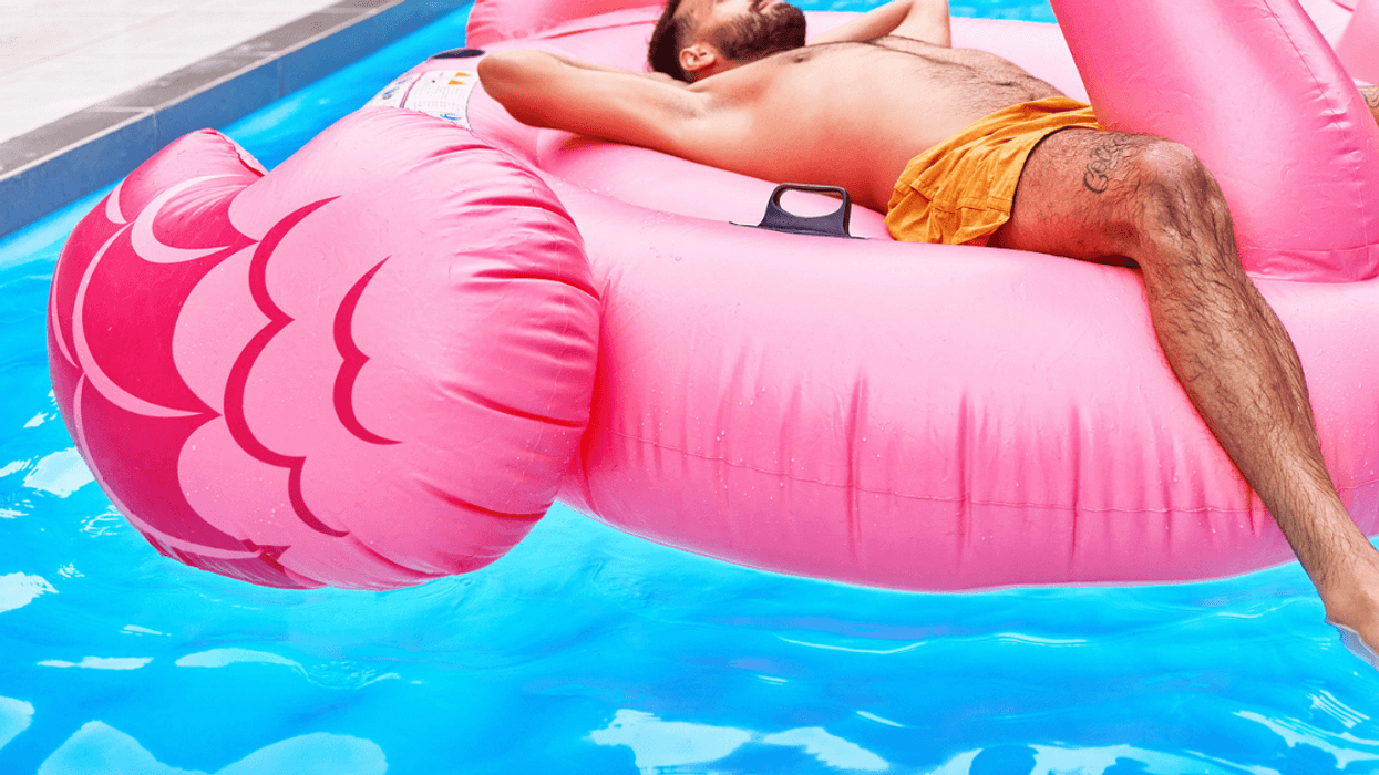 Guy relaxing at the pool