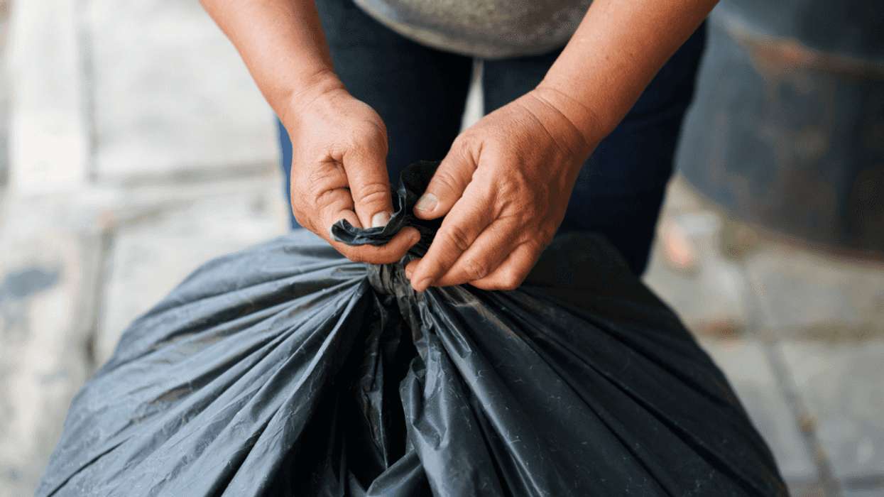 Guy with trash bag