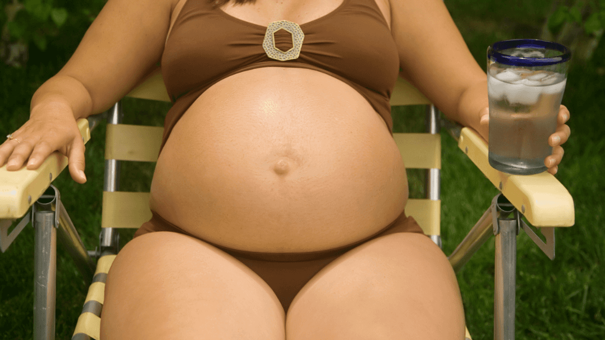 Pregnant Woman Stunned When Infertile Neighbors Demand She Stop Sunbathing In Her Own Yard