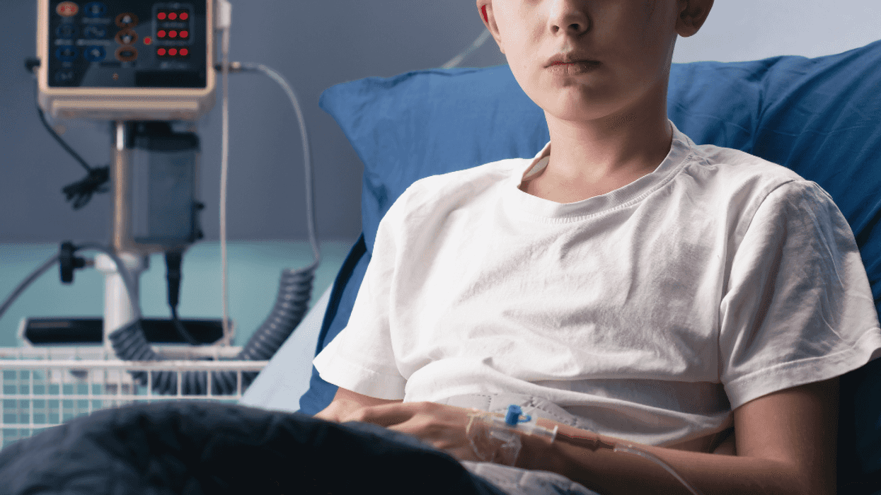 ill boy in hospital bed