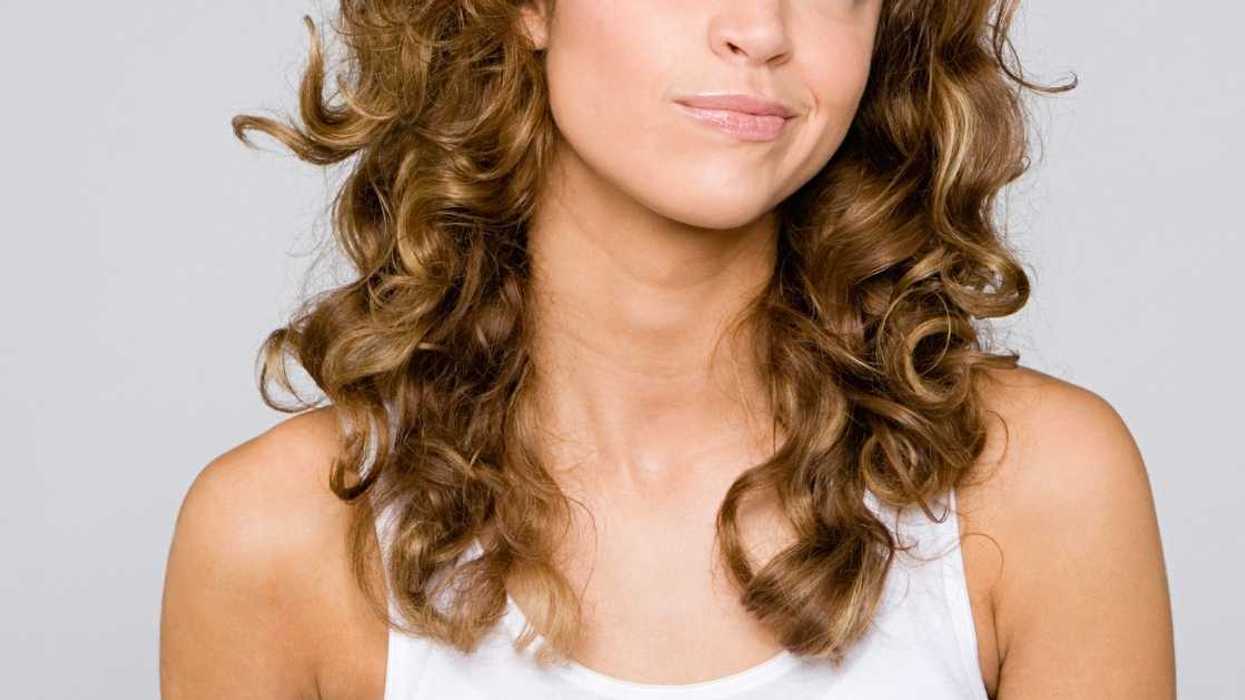 Woman Confused When Her Friends Call Her An 'A**hole' For Comparing Braces To A Boob Job