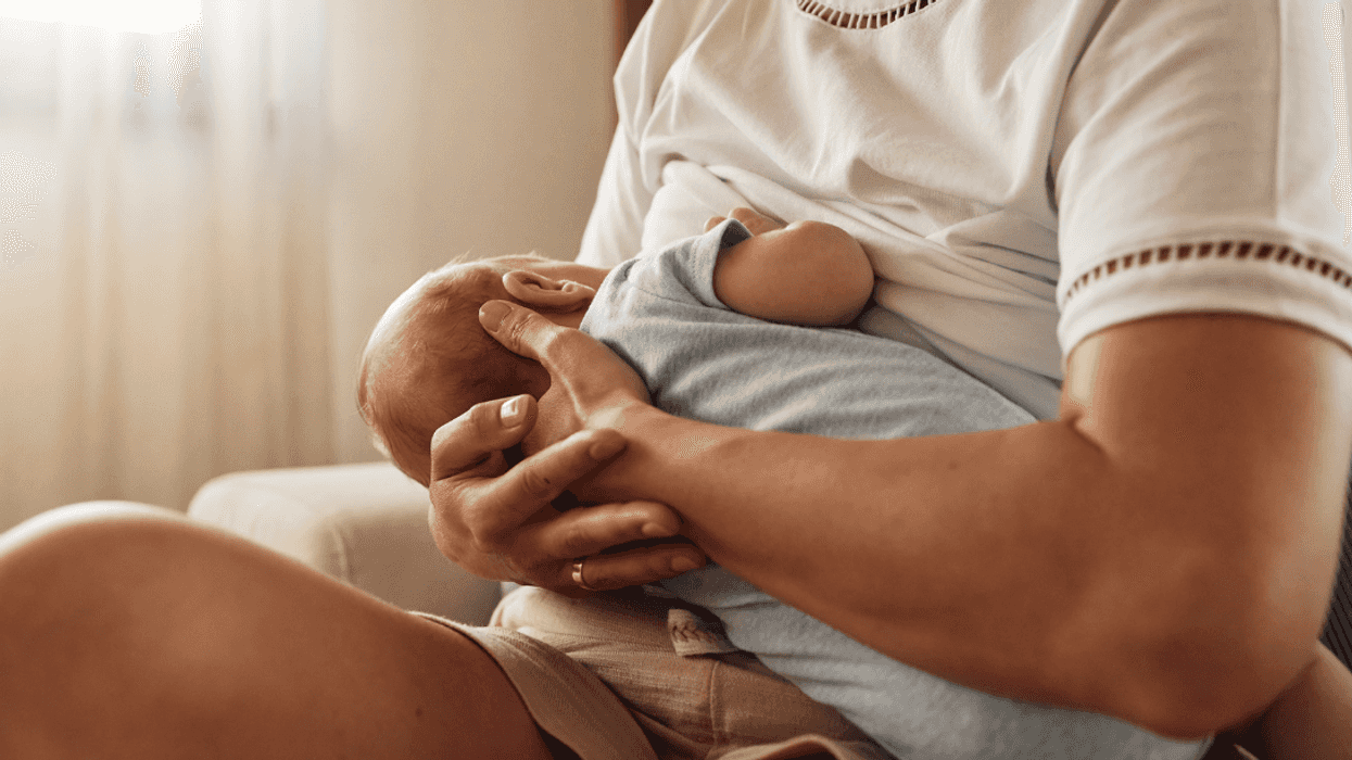 infant being breastfed