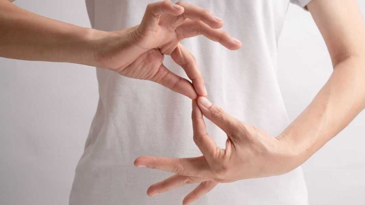 International day of Sign Languages poster. A pair of hands making a symbol. Connect. Isolated on white background.