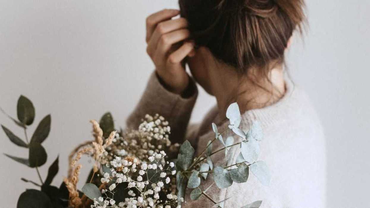 Woman Claps Back After Coworker Says Husband Is 'Overcompensating' By Sending Flowers To The Office