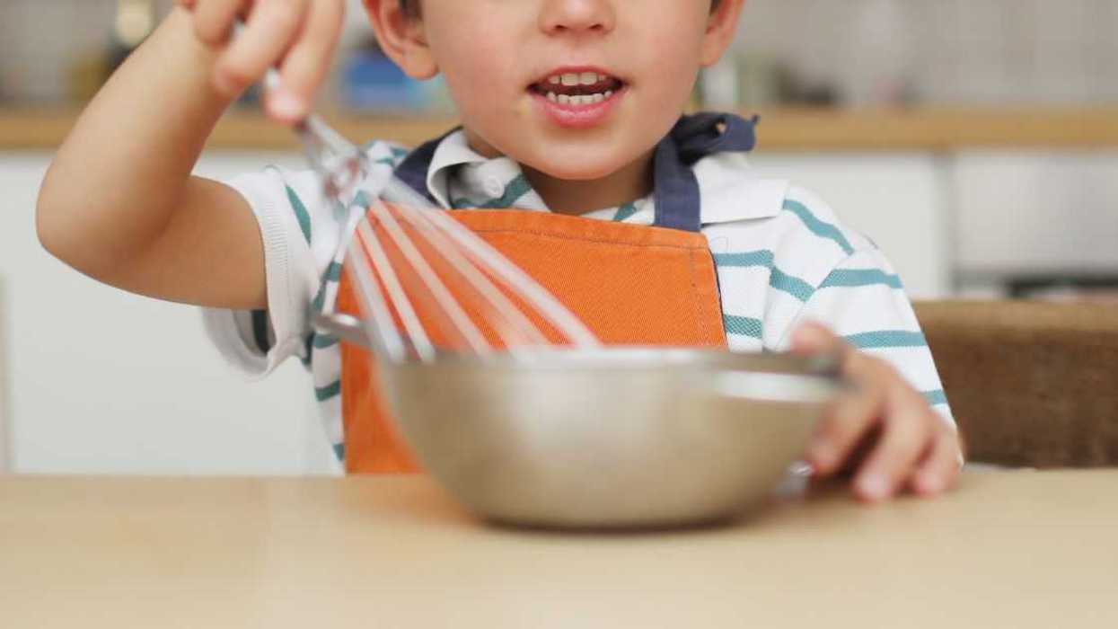 Little boy playing chef