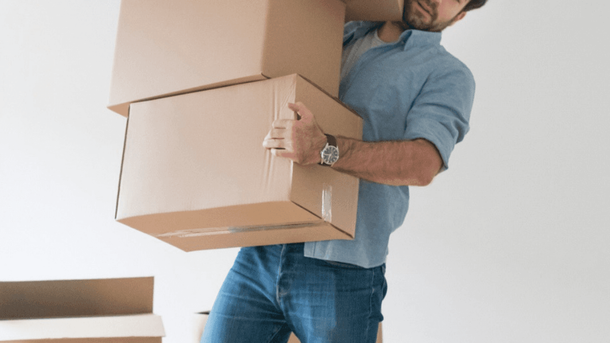 Man carrying moving boxes
