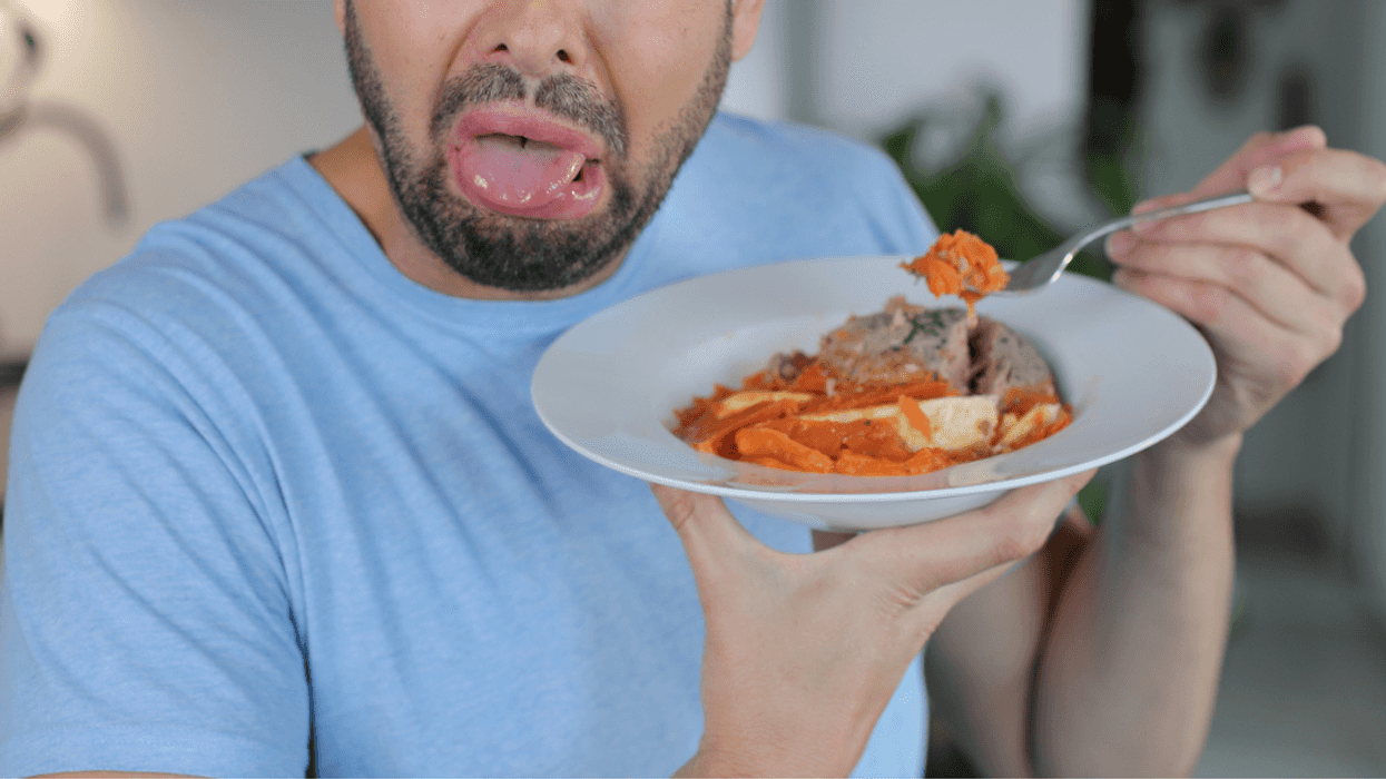 Man disgusted by plate of food