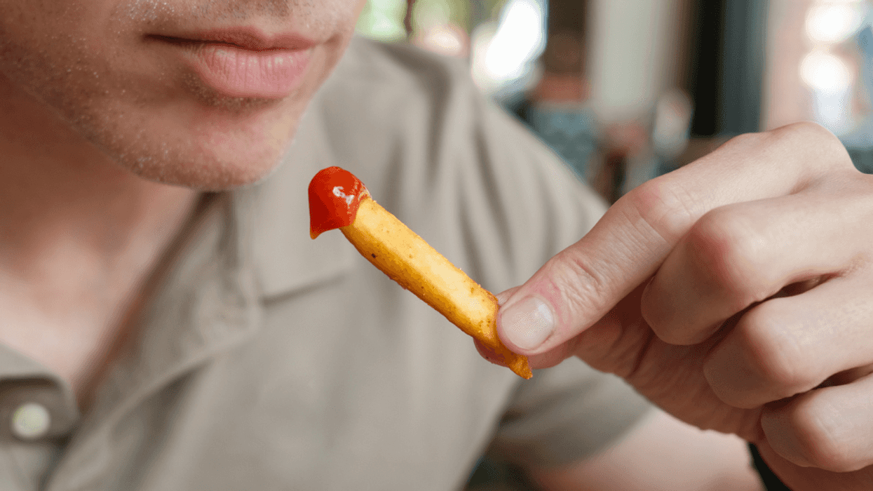 Man eating french fries