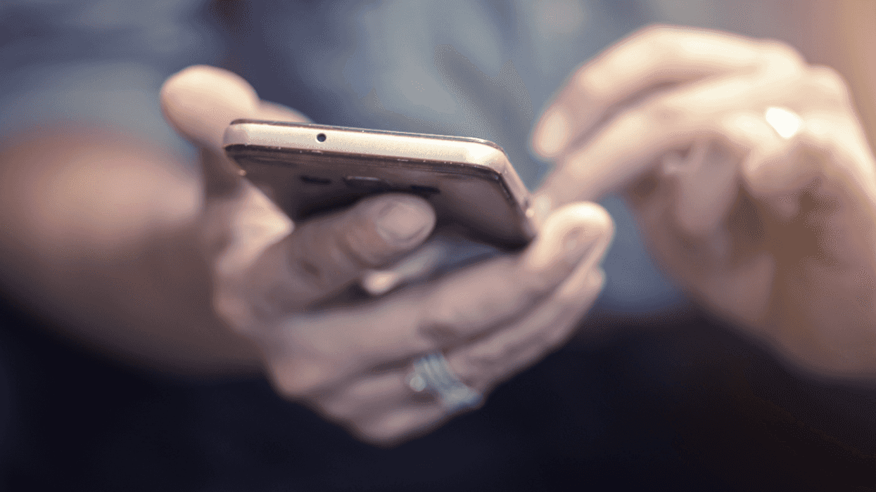 Man looking at his cell phone