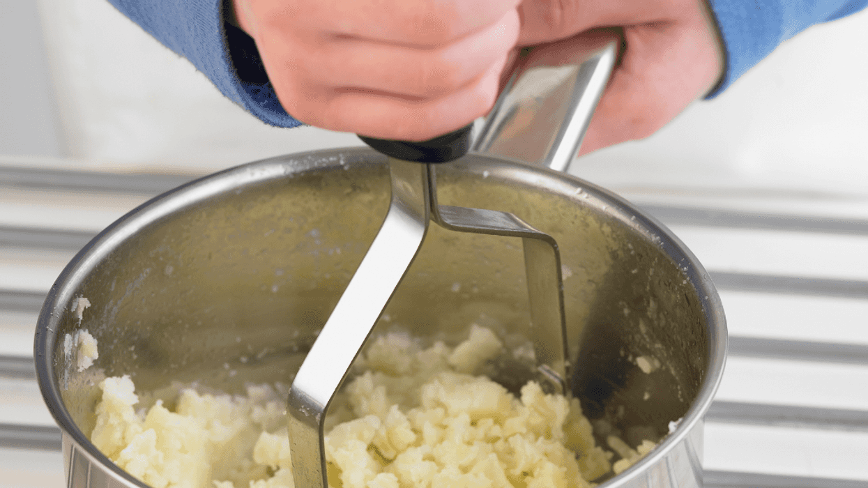 man making mashed potatoes