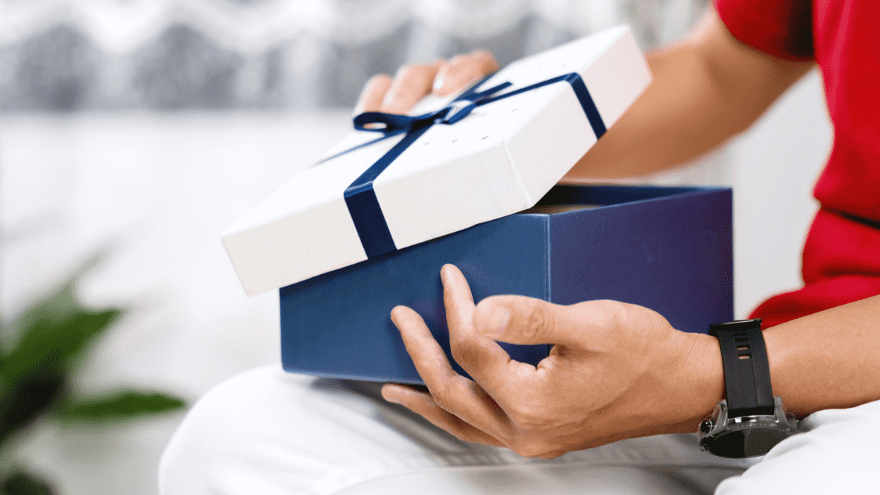 Man opening a gift
