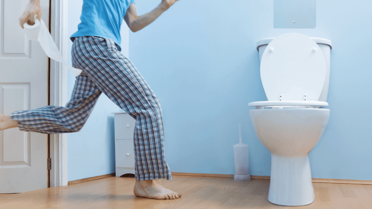 Man running to use the toilet