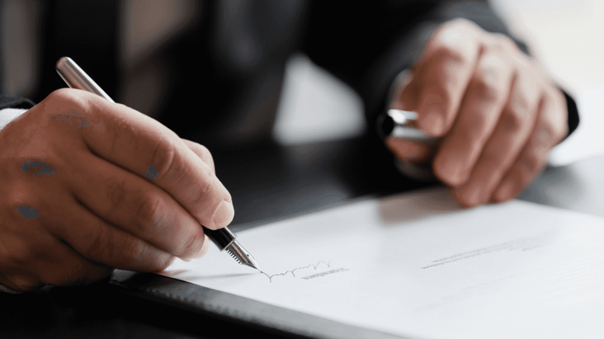 Man signing a contract