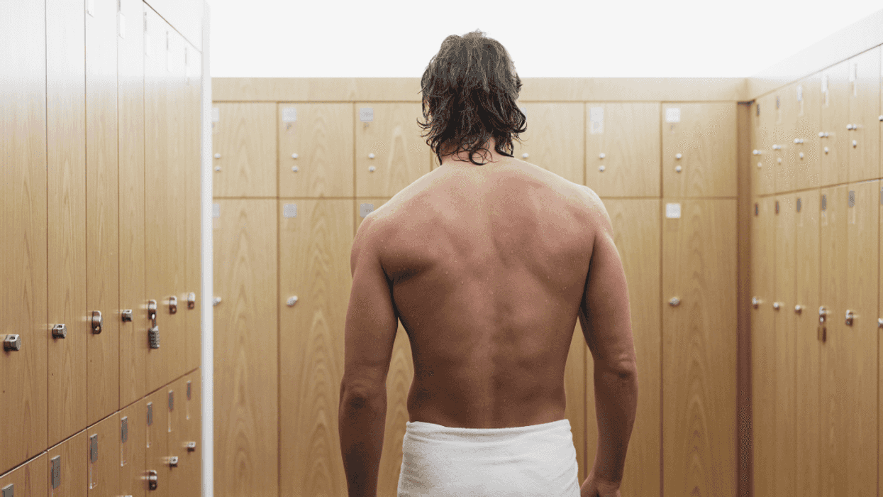 man standing in locker room
