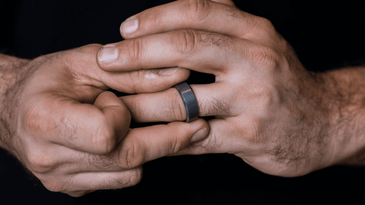Man taking off his wedding ring