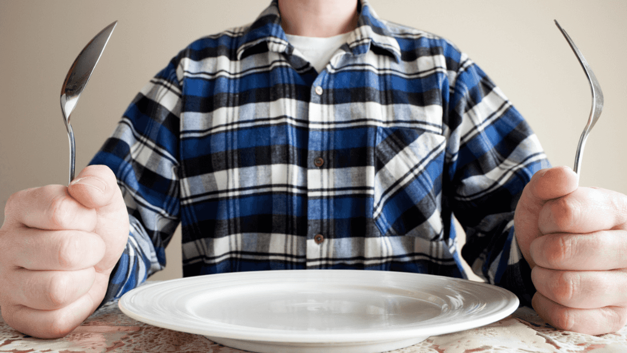 Man waiting impatiently for meal