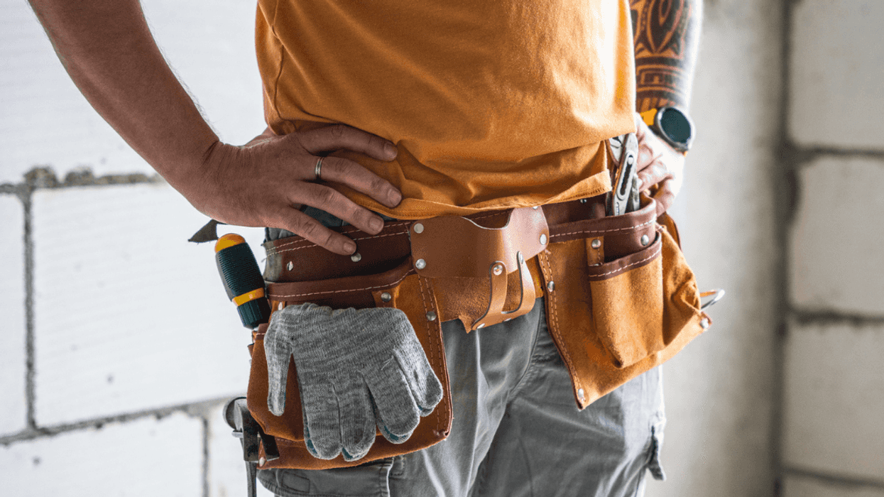 man wearing tool belt