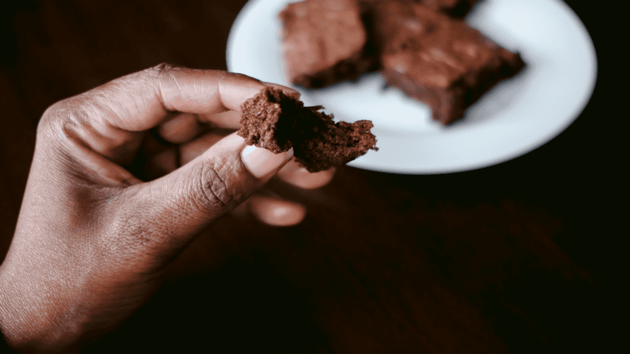 Man with fudge in his hands.