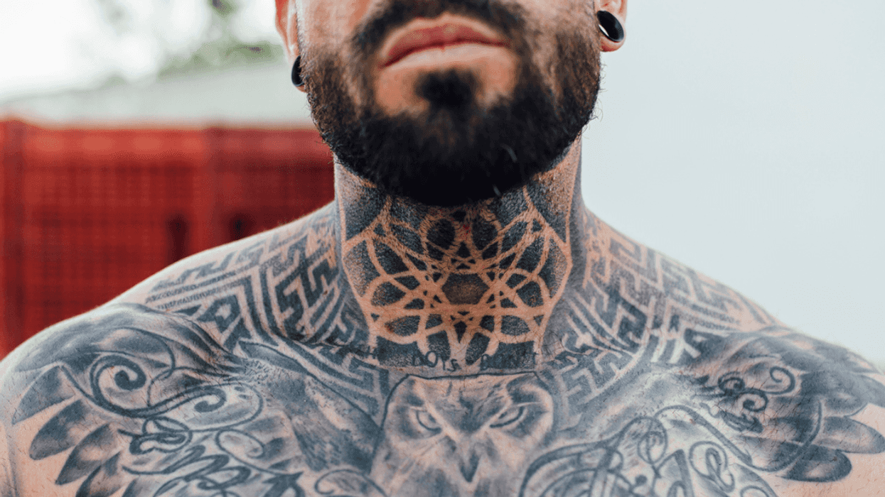 Man with neck tattoo