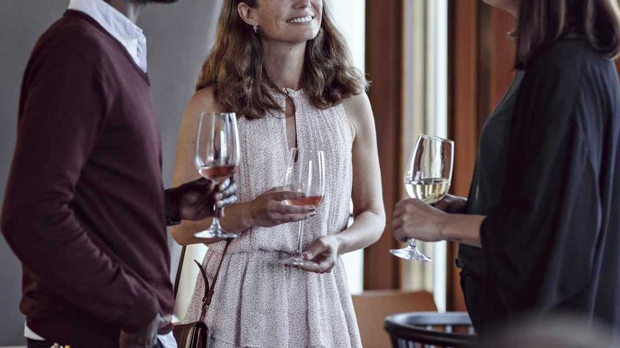 Woman Tells Coworker That She Knows He's Secretly Gay—Only To Be Introduced To His Wife