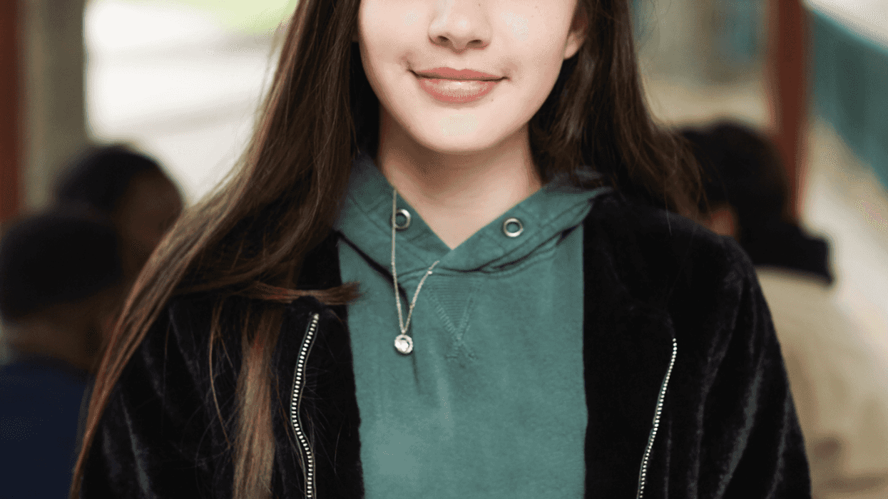 Mixed-race teenage girl.