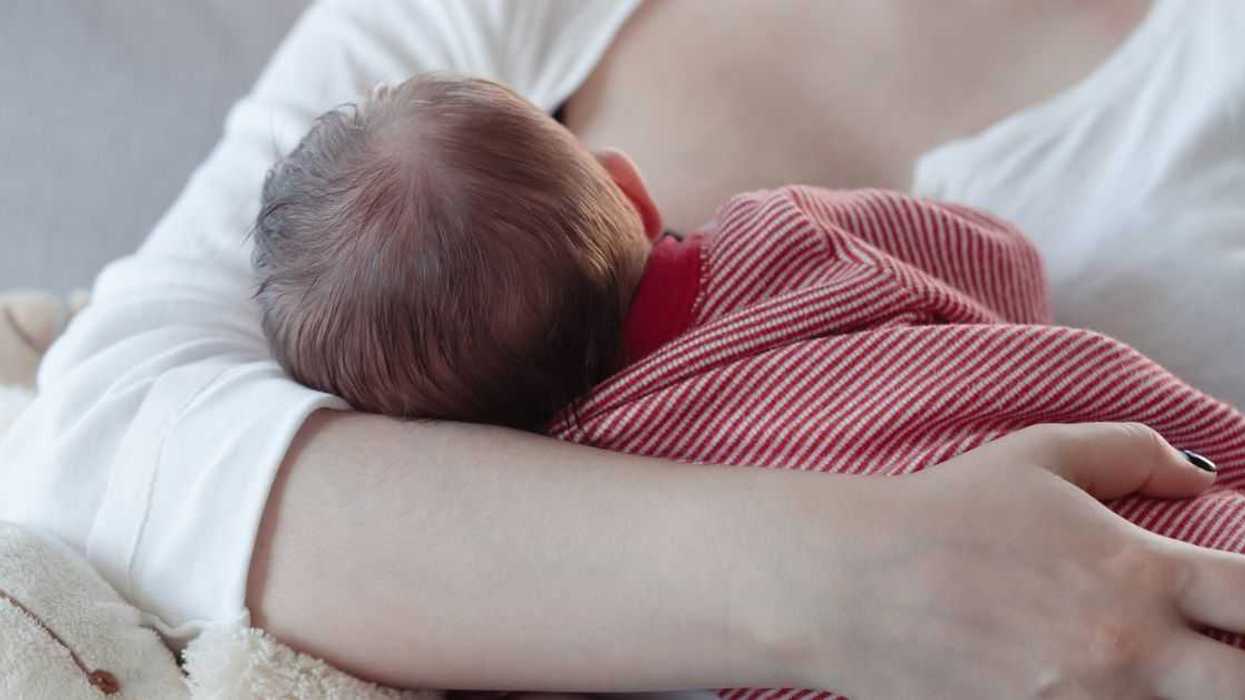 Mom breastfeeding a baby.