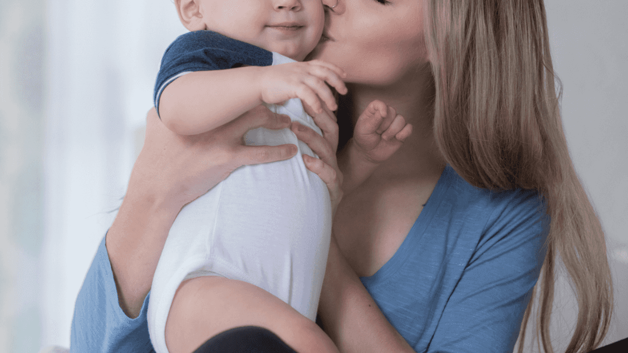 Mom cuddling with her baby