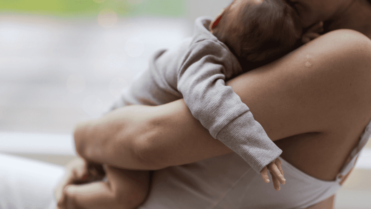 Mom holding her newborn baby
