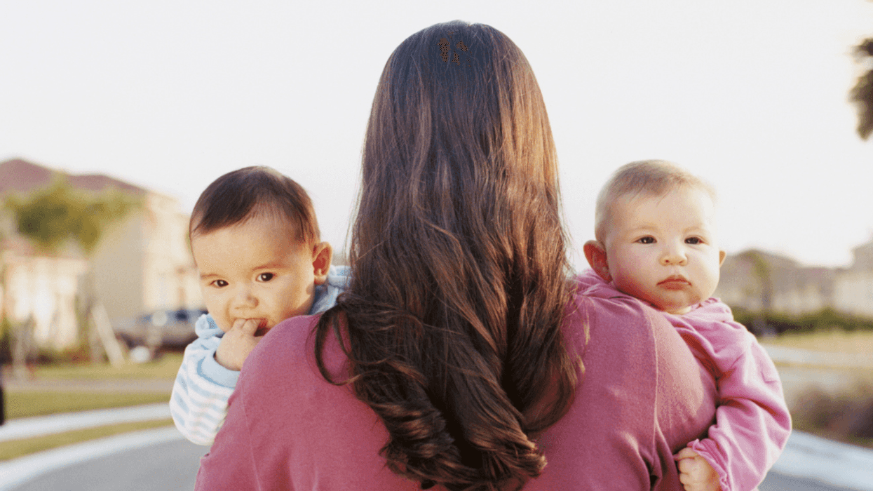 Mom holding twins